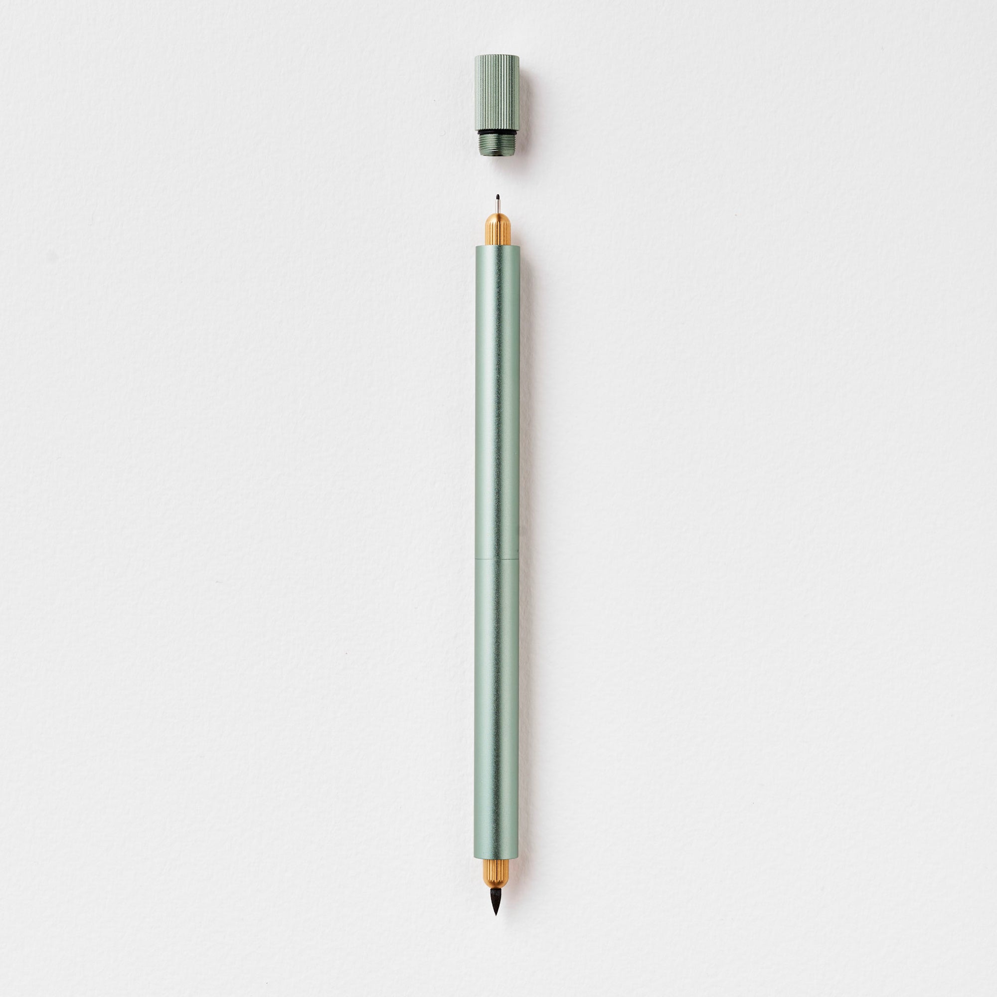 The Lumos Pro Duo Refillable Pen in Sage on white background