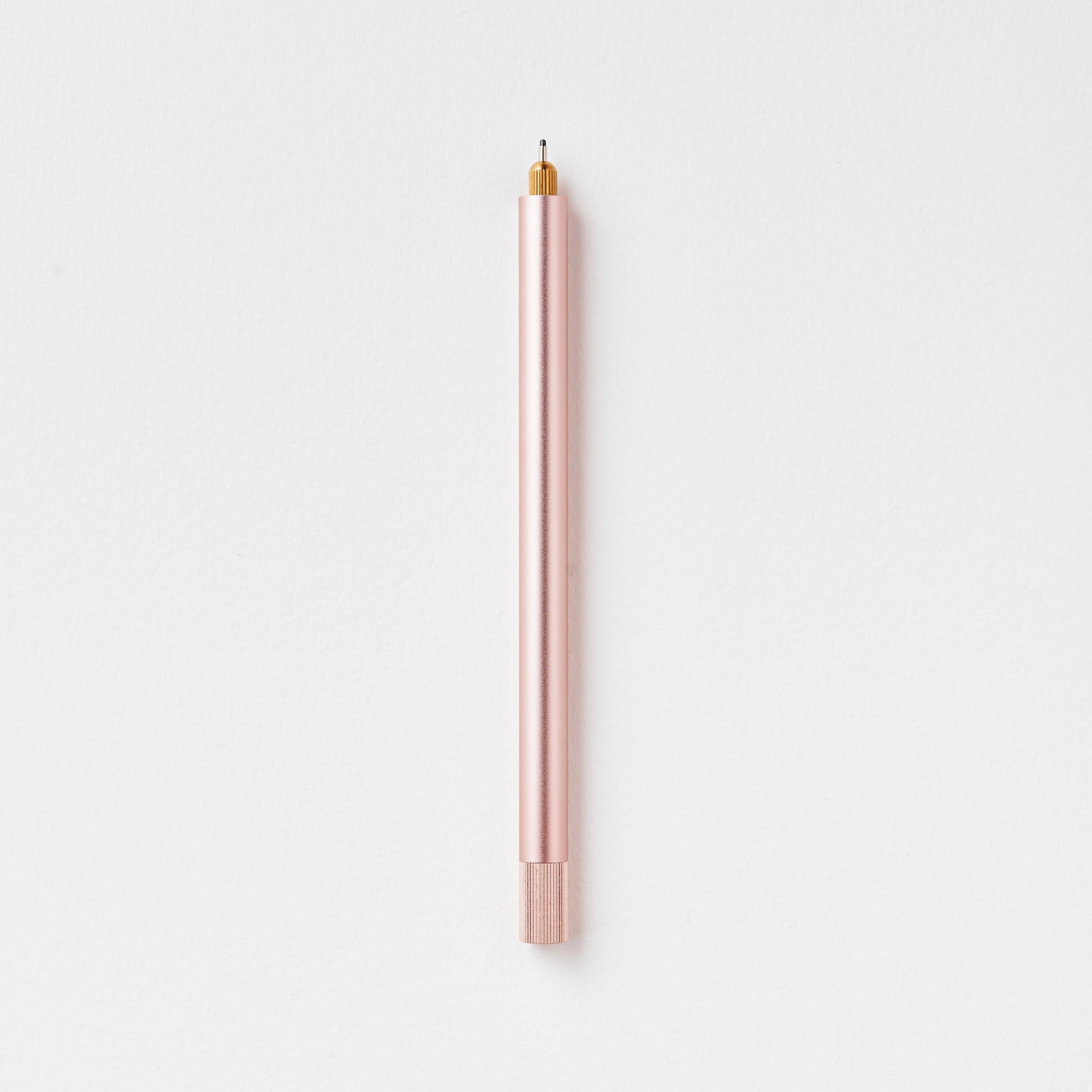 The Lumos Pro Single Refillable Pen in Blush on white background