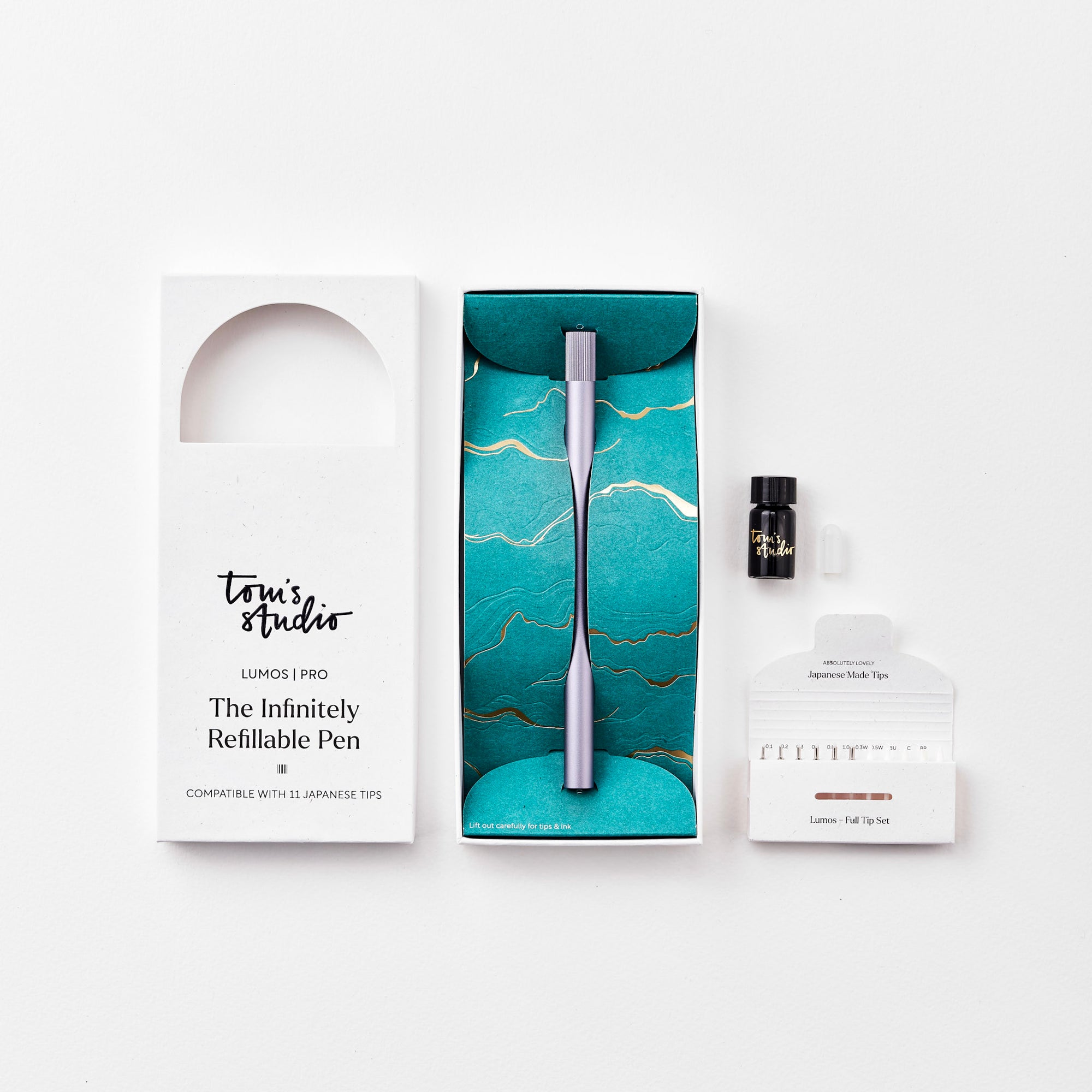 The Lumos Pro Single Refillable Pen in Lilac with packaging on white background