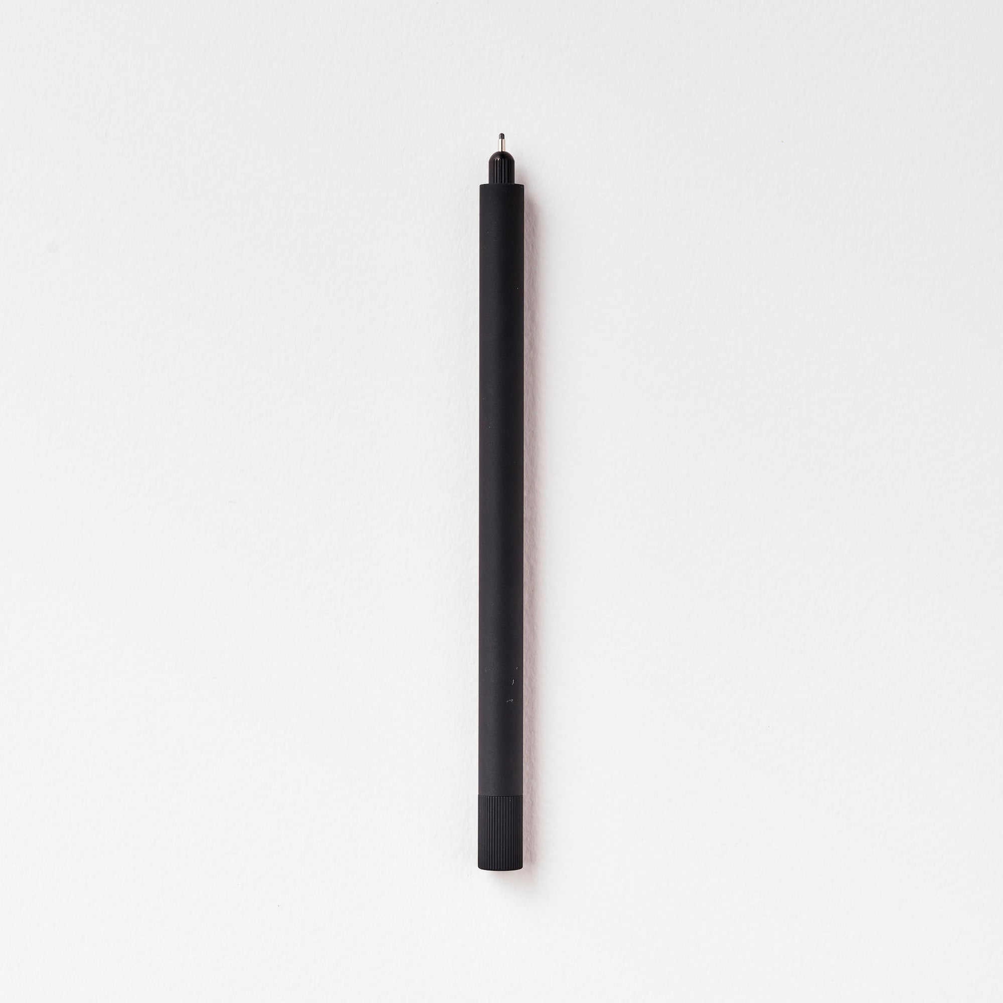 The Lumos Pro Single Refillable Pen in Matte Black on white background