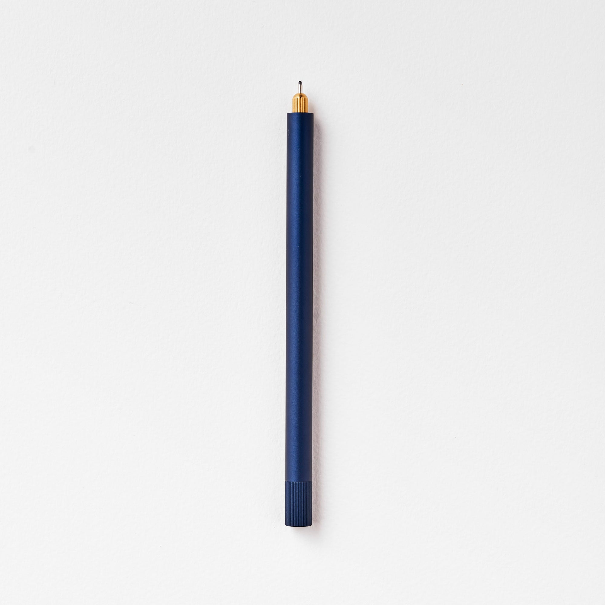 The Lumos Pro Single Refillable Pen in Midnight on white background