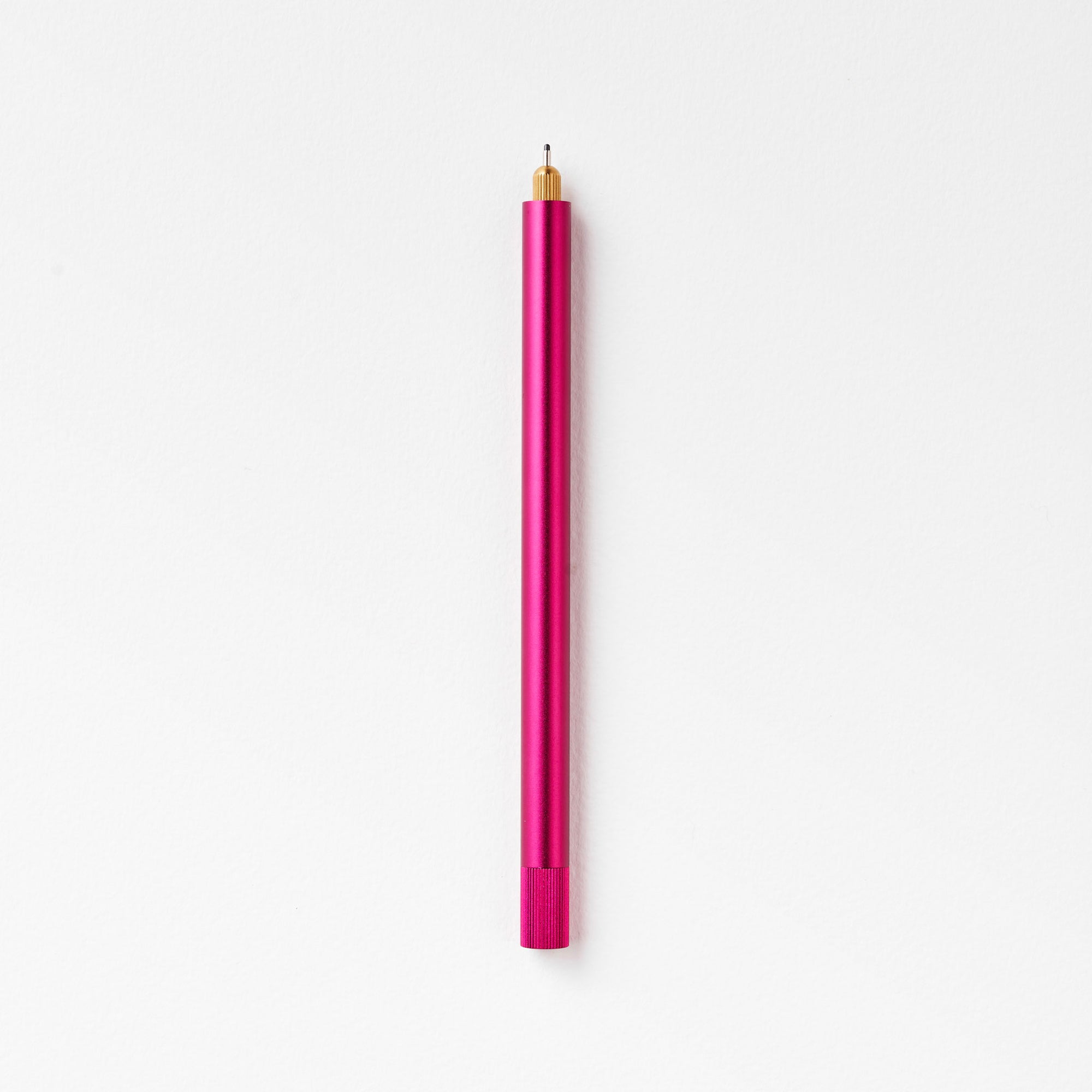 The Lumos Pro Single Refillable Pen in Raspberry on white background