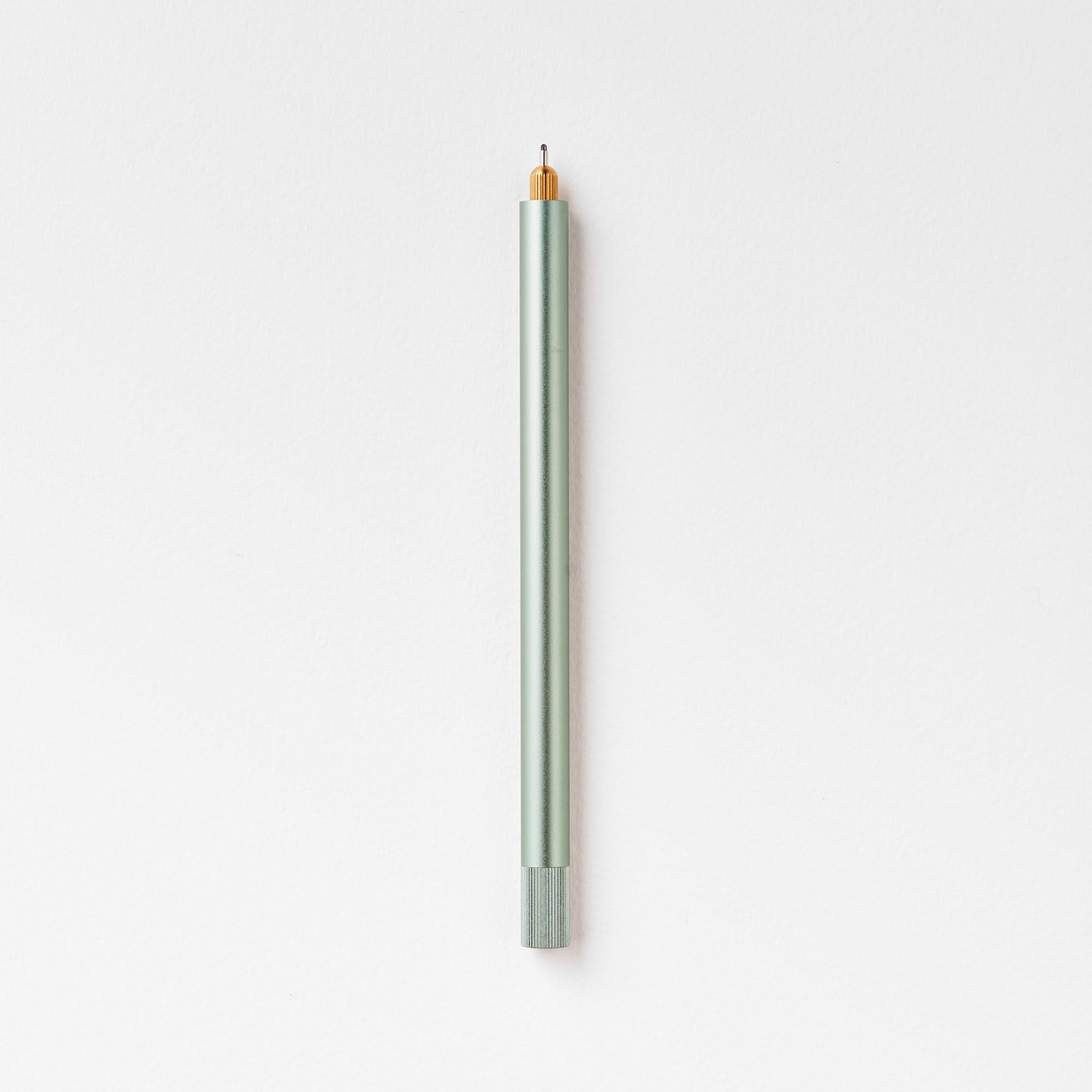 The Lumos Pro Single Refillable Pen in Sage on white background