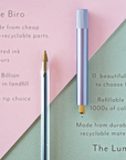 Comparison of a disposable biro and the Lumos Mini  refillable pen (shown in Lilac)