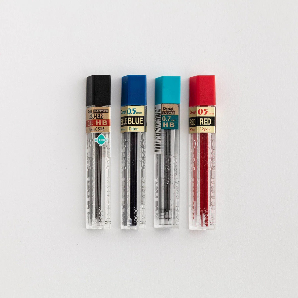 4 packets of mechanical pencil leads in black, dark blue, light blue and red displayed on a white background.