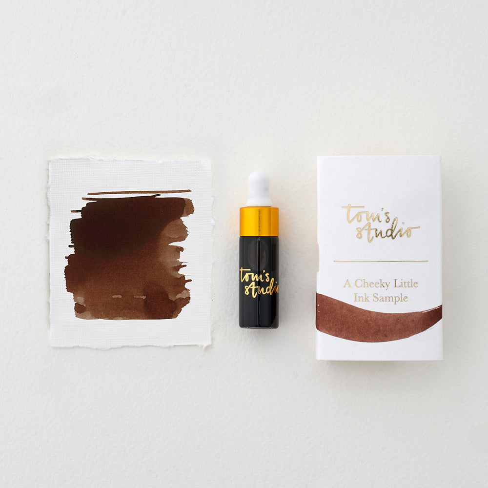 Tom's Studio Espresso Mini Fountain Pen Ink – featuring the packaging, bottle with pipette in lid and swatch