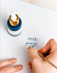 Video showing application of Tom's Studio Calligraphy Ink using Flourish Calligraphy Pen and One Dip Wonder ink extender tool.