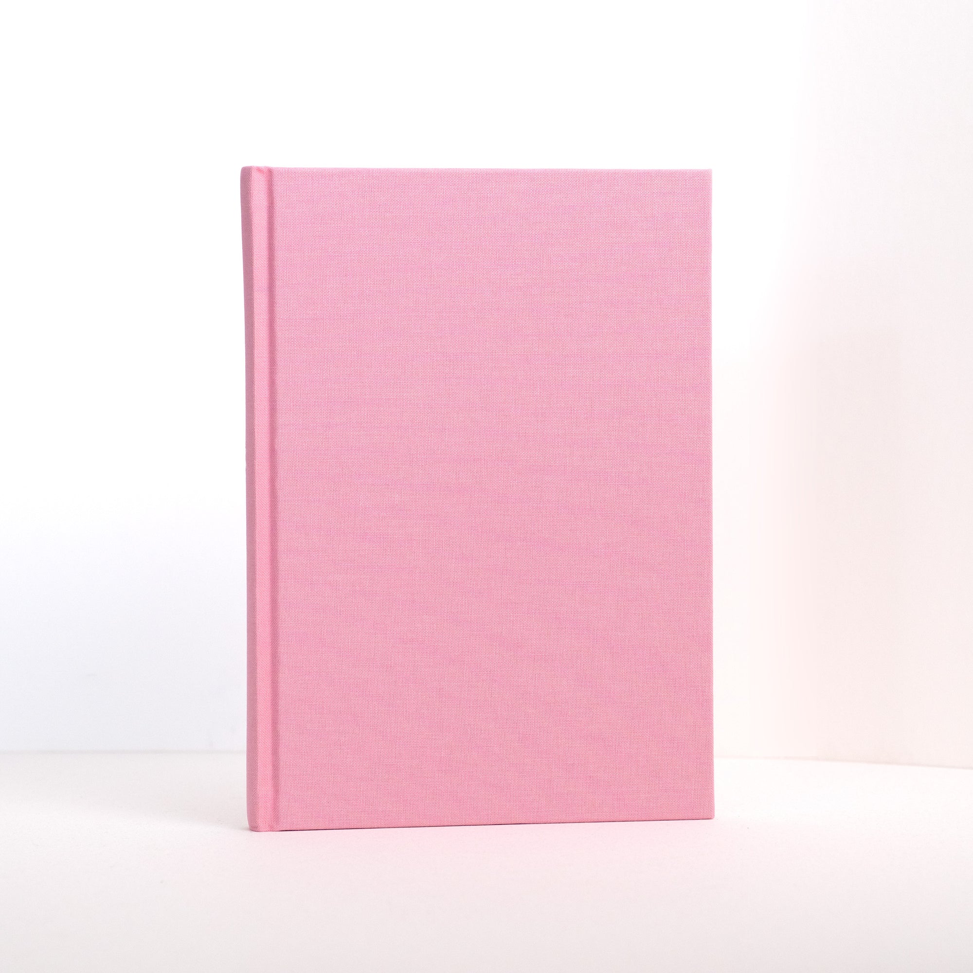 Semikolon A5 notebook in Flamingo pink with premium linen bound cover.