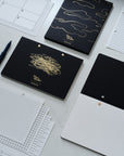 Cover for the Studio Pad refillable, customisable notebook and organiser in black with gold foil detail