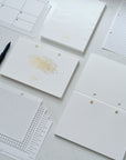 Cover for the Studio Pad refillable, customisable notebook and organiser in white with gold foil detail