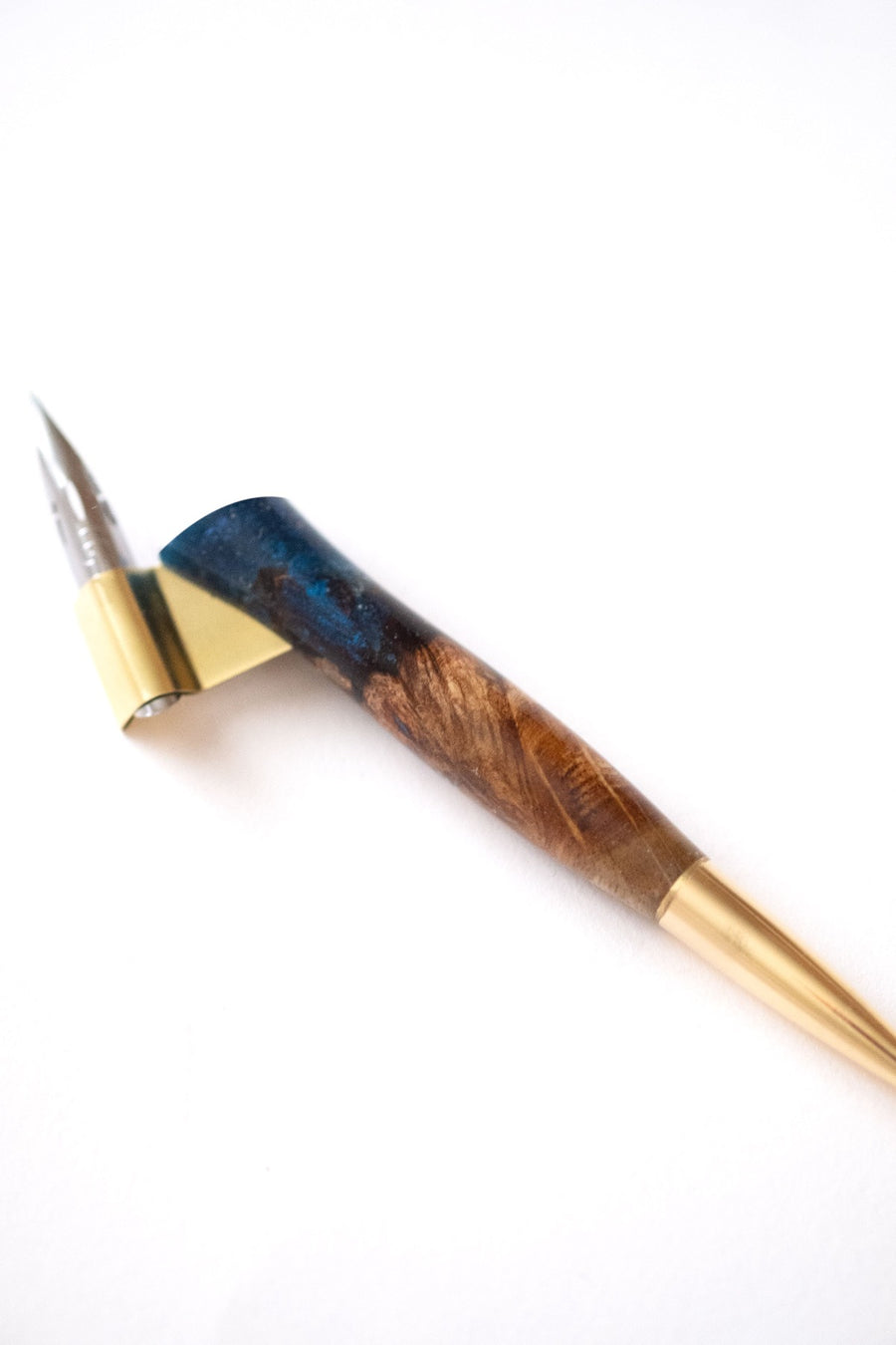 Close up of Limited edition calligraphy pen in British timber with a brass tail