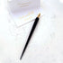 The Original Flourish Straight Calligraphy Pen in Black shown with calligraphy/hand lettered place cards