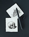 the lumos duo refillable fineliner in black with fineliner drawings