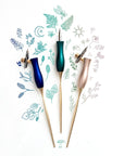3 different versions of The Bloom modern calligraphy pen on a background of illustrations in ink