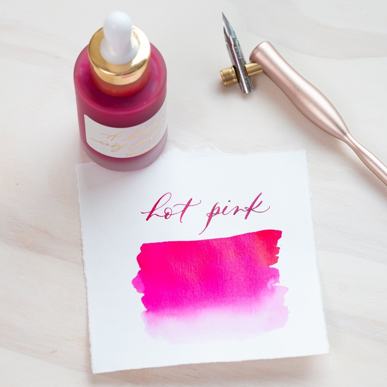 Hot Pink - Calligraphy Ink in bottle with swatch showing the ink colour