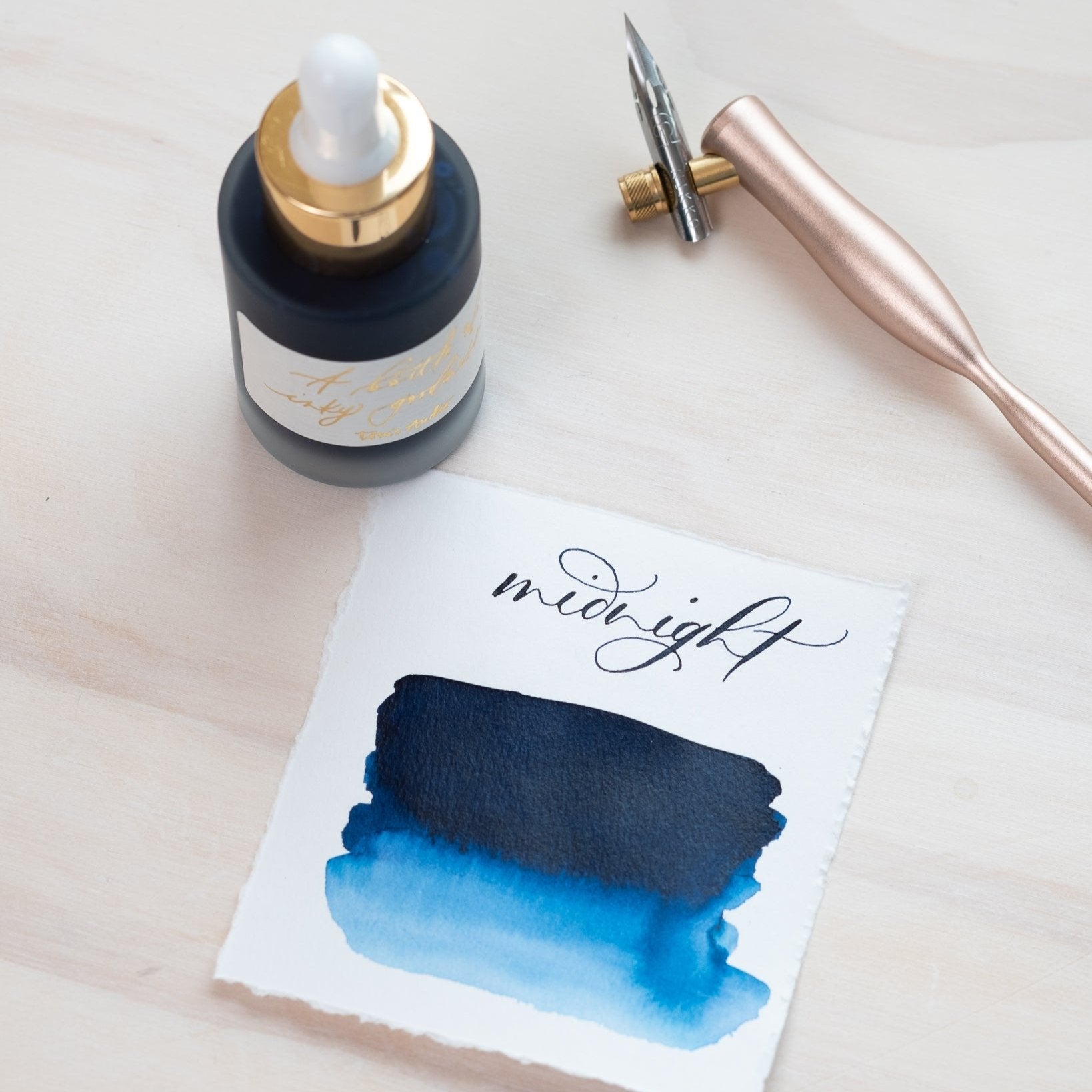 Midnight - Calligraphy Ink in bottle with swatch showing the ink colour