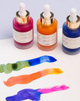 Mix Your Own Calligraphy Ink gift set including Sunflower, Ultra Marine and Hot Pink, with samples of colour mixing on paper