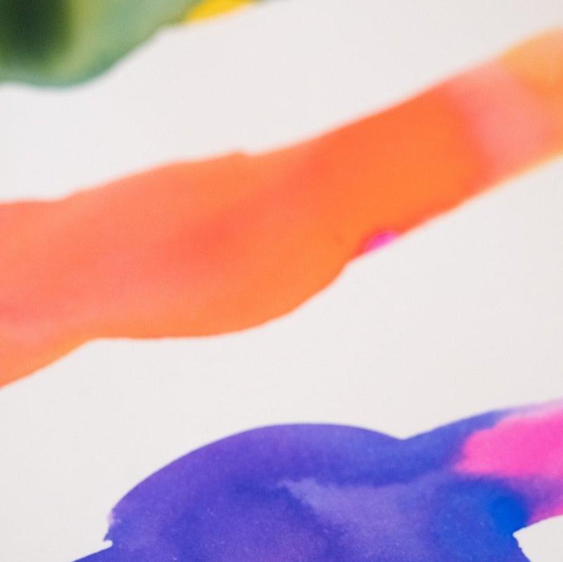 Close up shot of ink colour mixing on paper created using the Mix Your Own Calligraphy Ink gift set