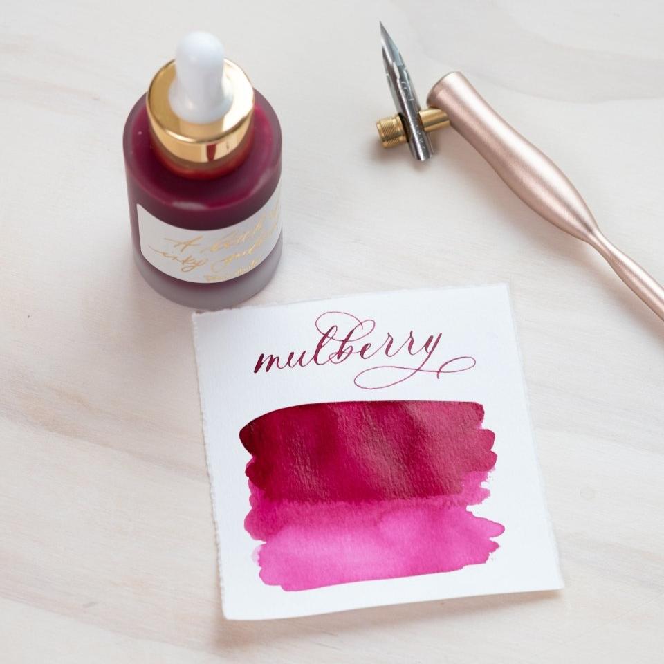 Mulberry - Calligraphy Ink in bottle with swatch showing the ink colour