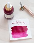 Mulberry - Calligraphy Ink in bottle with swatch showing the ink colour