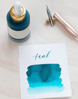 Teal - Calligraphy Ink in bottle with swatch showing the ink colour