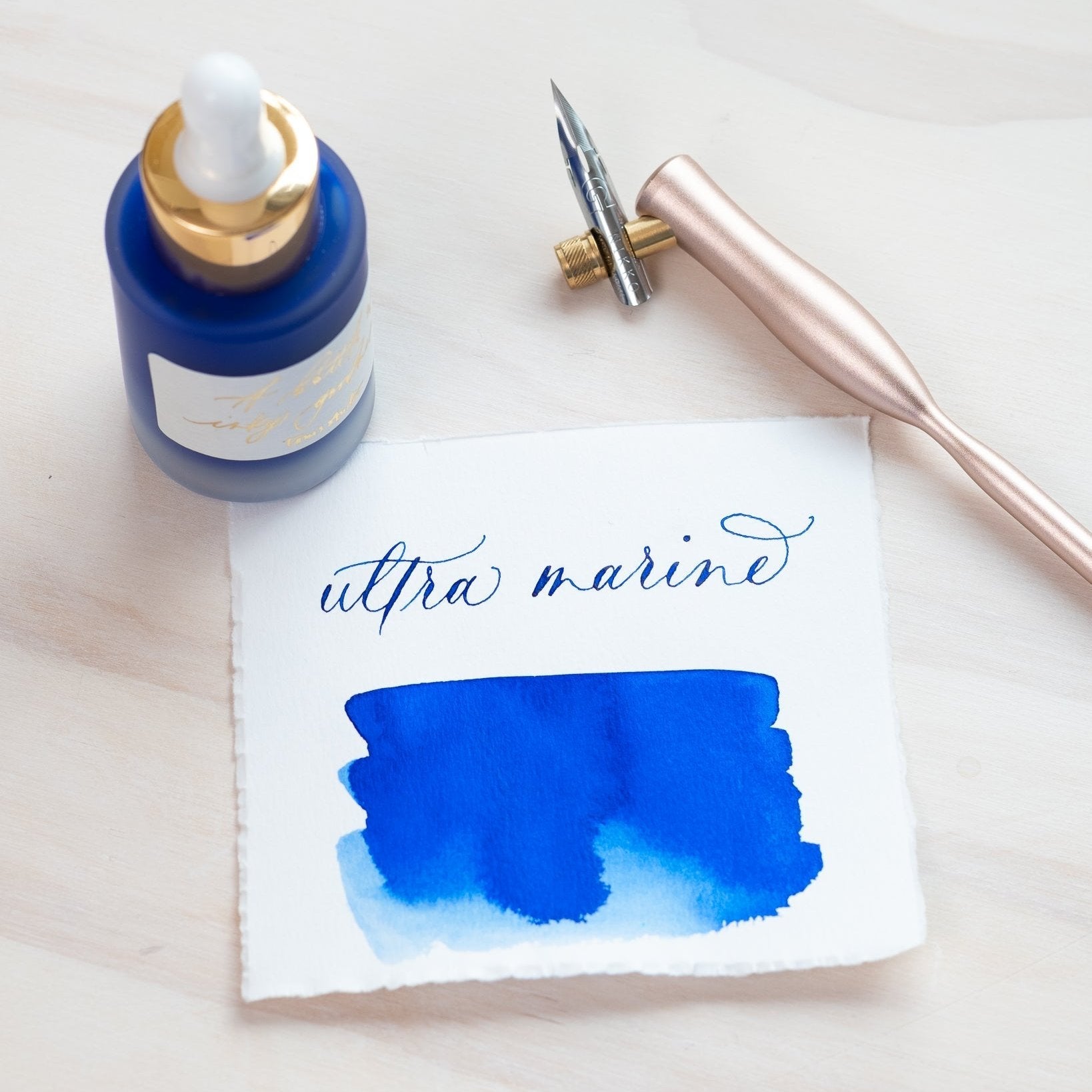 Ultra Marine - Calligraphy Ink in bottle with swatch showing the ink colour