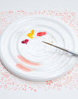 A fine bone china artists palette with paint on