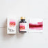 Tom's Studio Cassis Fountain Pen Ink – featuring the packaging, bottle and a swatch on paper