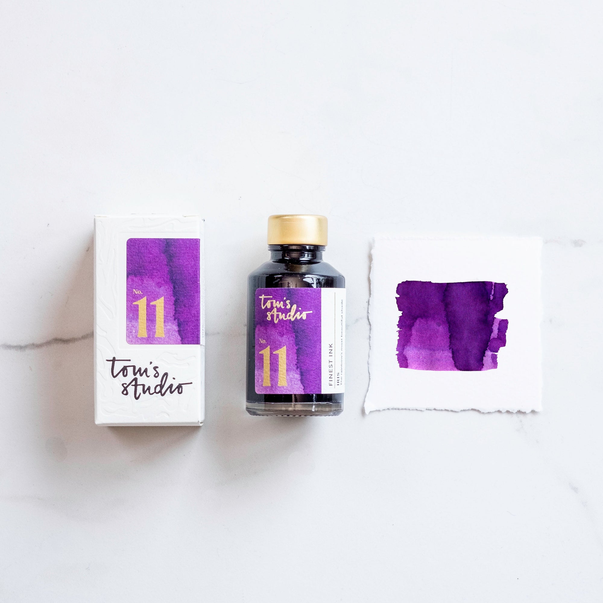 Tom's Studio Iris Fountain Pen Ink – featuring the packaging, bottle and a swatch on paper