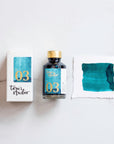 Tom's Studio Neptune Fountain Pen Ink – featuring the packaging, bottle and a swatch on paper