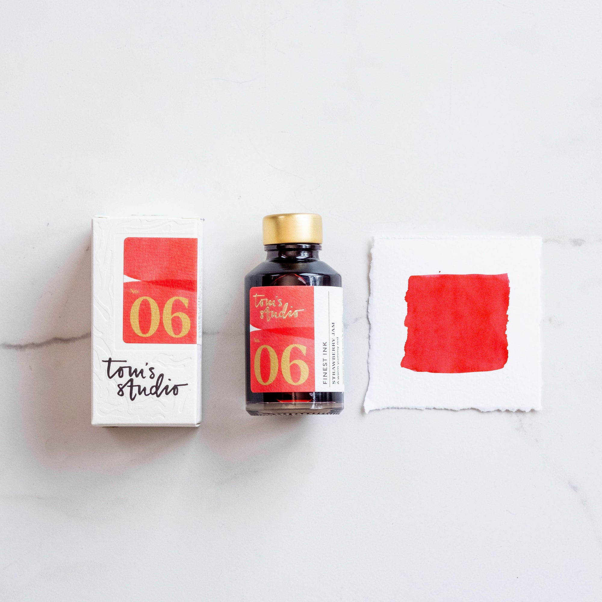 Tom's Studio Strawberry Jam Fountain Pen Ink – featuring the packaging, bottle and a swatch on paper