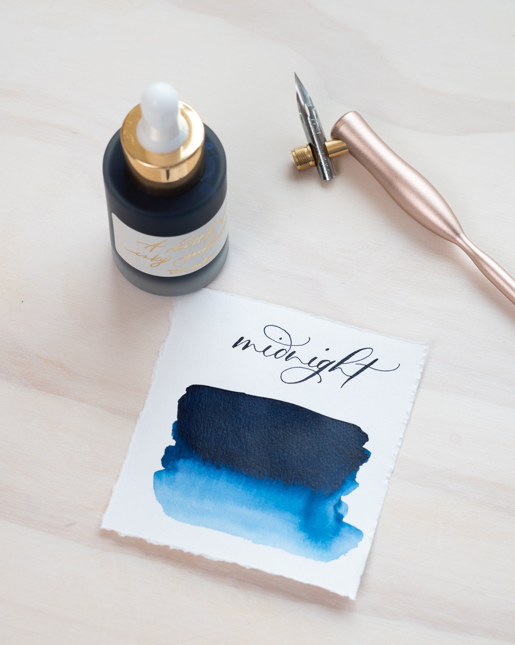 Midnight - Calligraphy Ink in bottle with swatch showing the ink colour