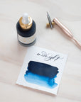 Midnight - Calligraphy Ink in bottle with swatch showing the ink colour