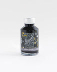 A bottle of Diamine moon dust grey shimmer ink