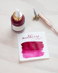 Mulberry - Calligraphy Ink in bottle with swatch showing the ink colour