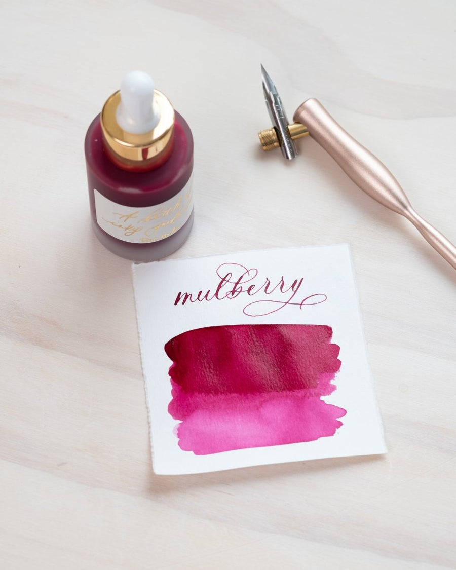 Mulberry - Calligraphy Ink in bottle with swatch showing the ink colour