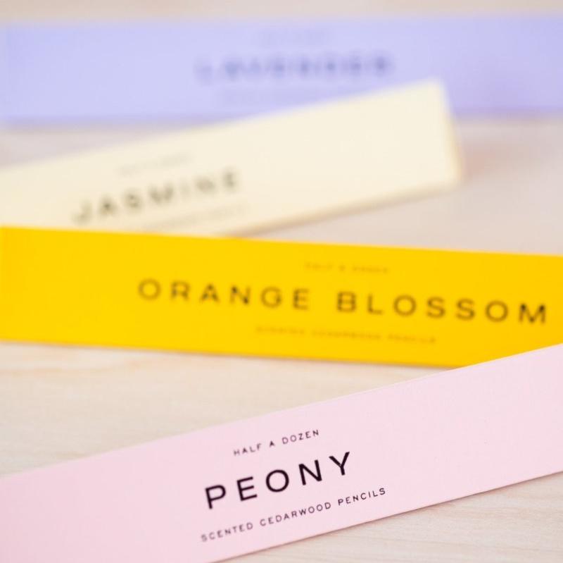 Peony scented pencils in their box with other scents in the background