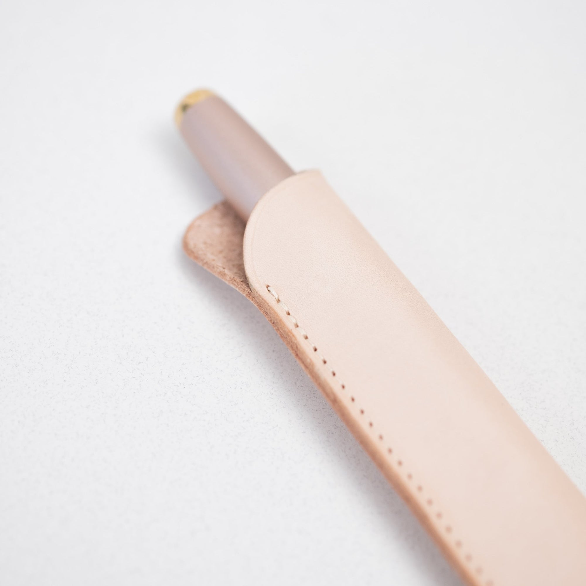 Detail of the Leather Pen Sleeve for the in Natural with the Studio Fountain Pen in Blush