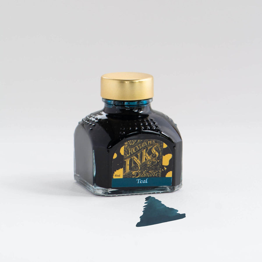 A bottle of teal Diamine fountain pen ink