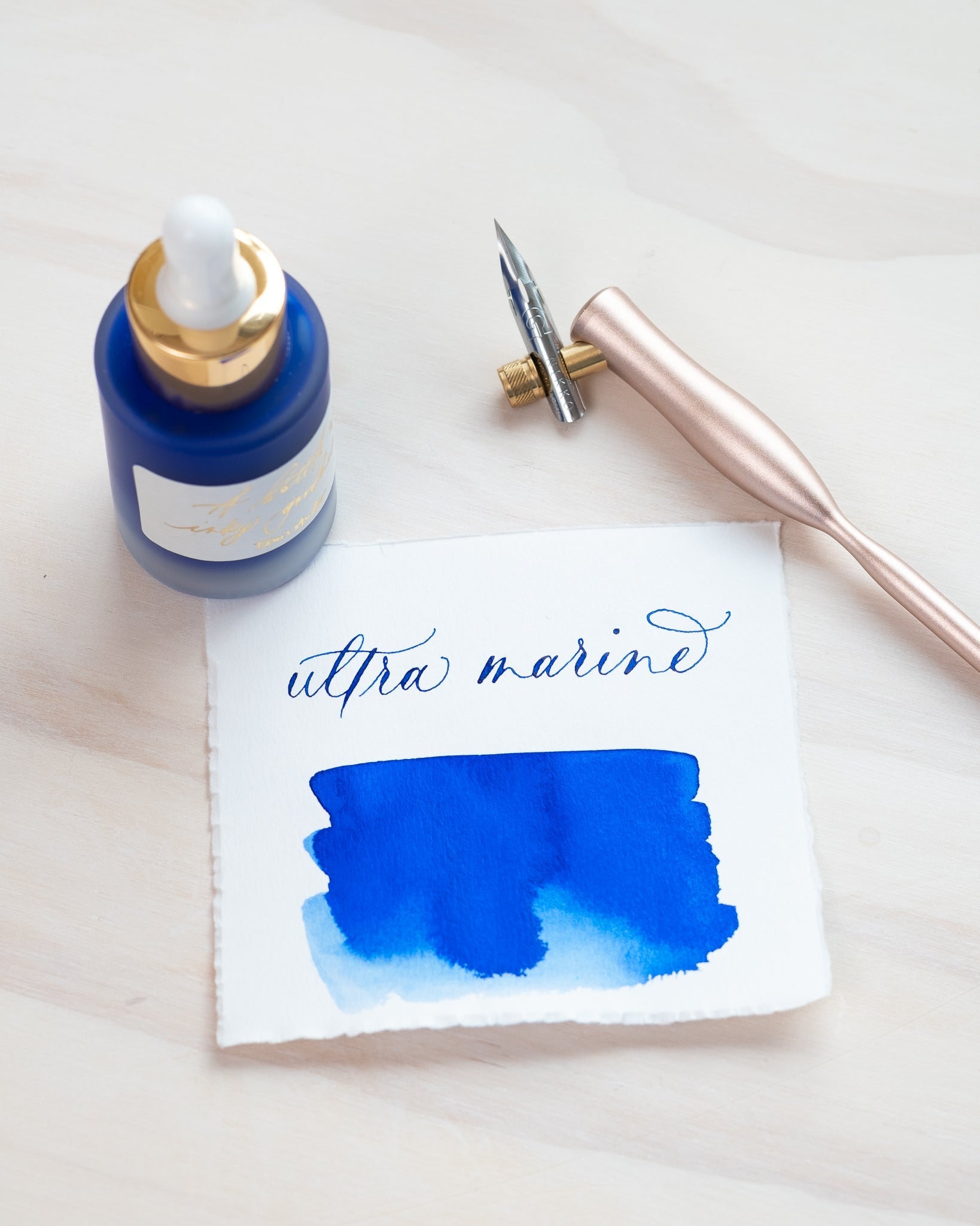 Ultra Marine - Calligraphy Ink in bottle with swatch showing the ink colour